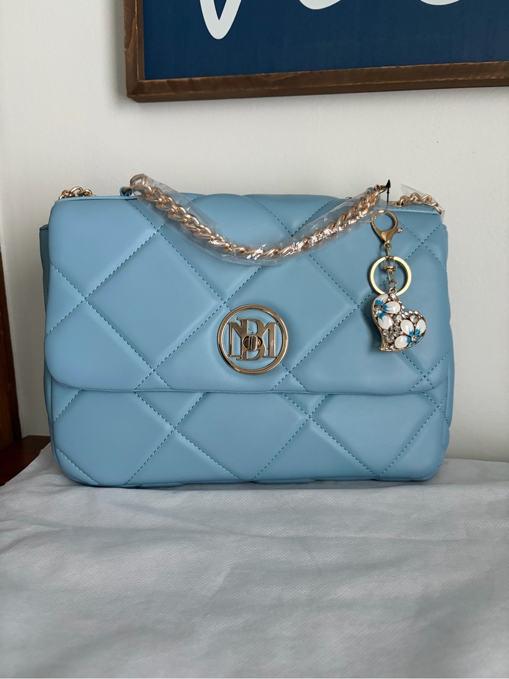 Badgley Mischka Quilted Sky Blue Shoulder Bag with gold heart bag charm
